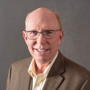 Portrait of Bob Havlicek looking at the camera and smiling