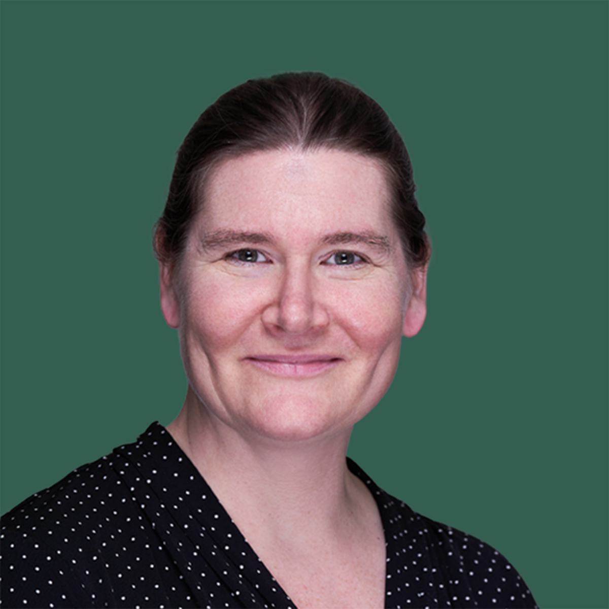 Portrait of Victoria Dodson looking at the camera and smiling