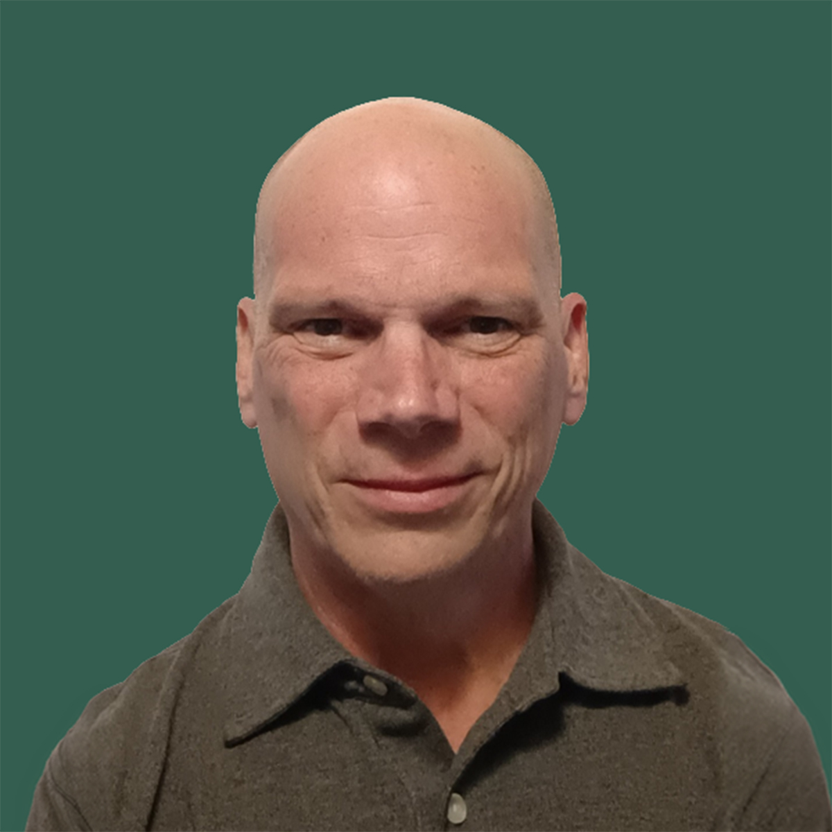 Portrait of Sean McGuire looking at the camera and smiling